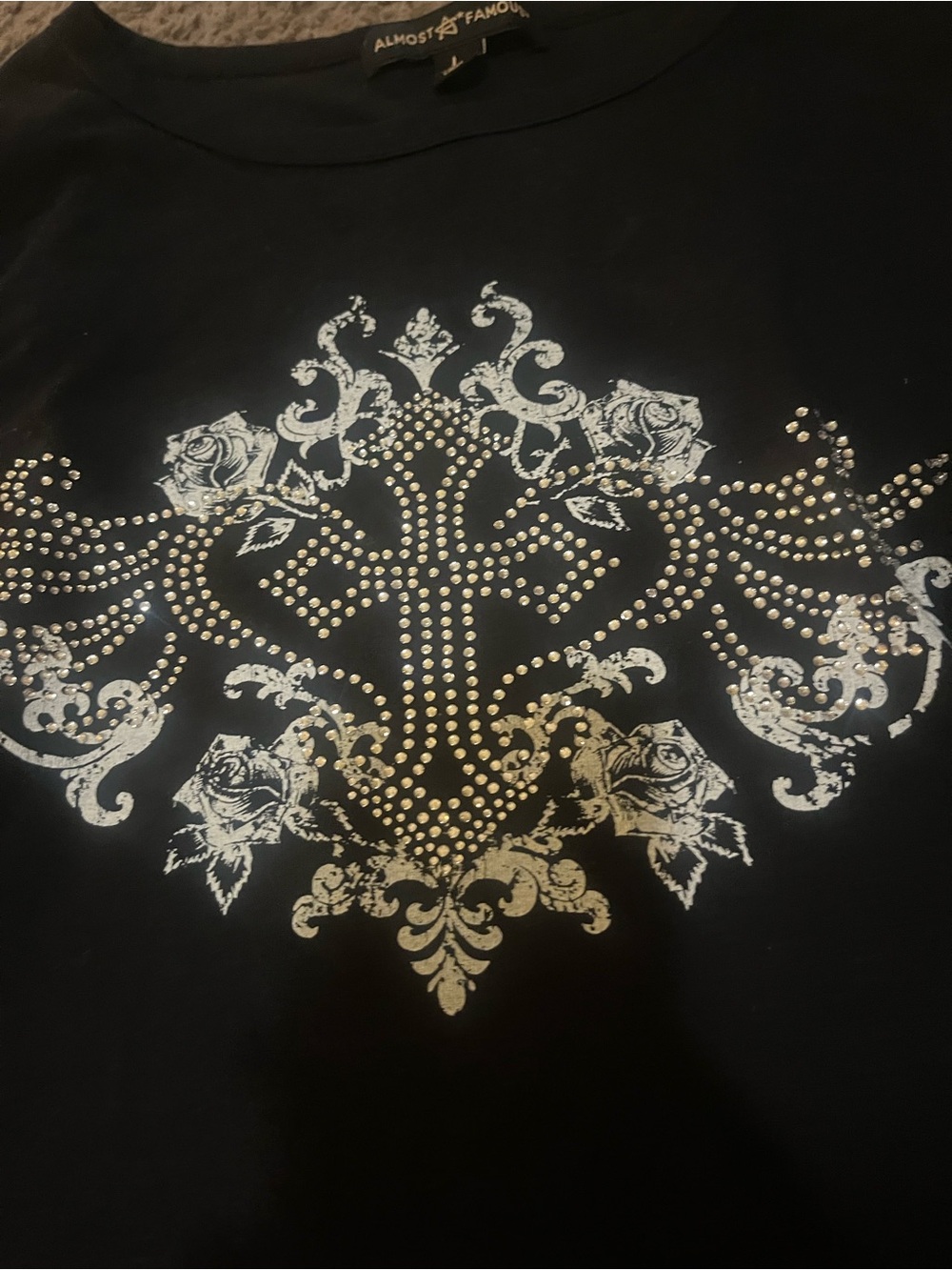 Almost Famous Black Tee with Silver Floral Stud Design